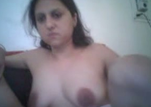 Kinky Indian housewife is acquiring her pussy rubbed in bush-league video